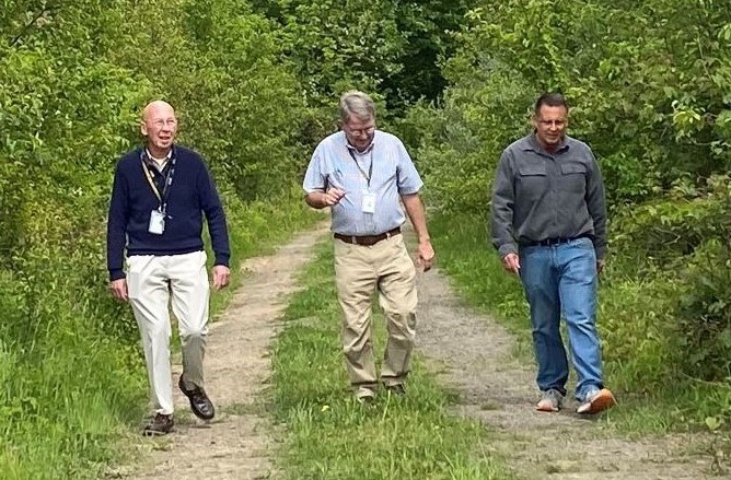 A recent site tour of remedial activities. Left to right are Mike McGee and Tom Ames with the Horsham Land Redevelopment Authority Along with Jim Rugh of the Navy’s Caretaker Office